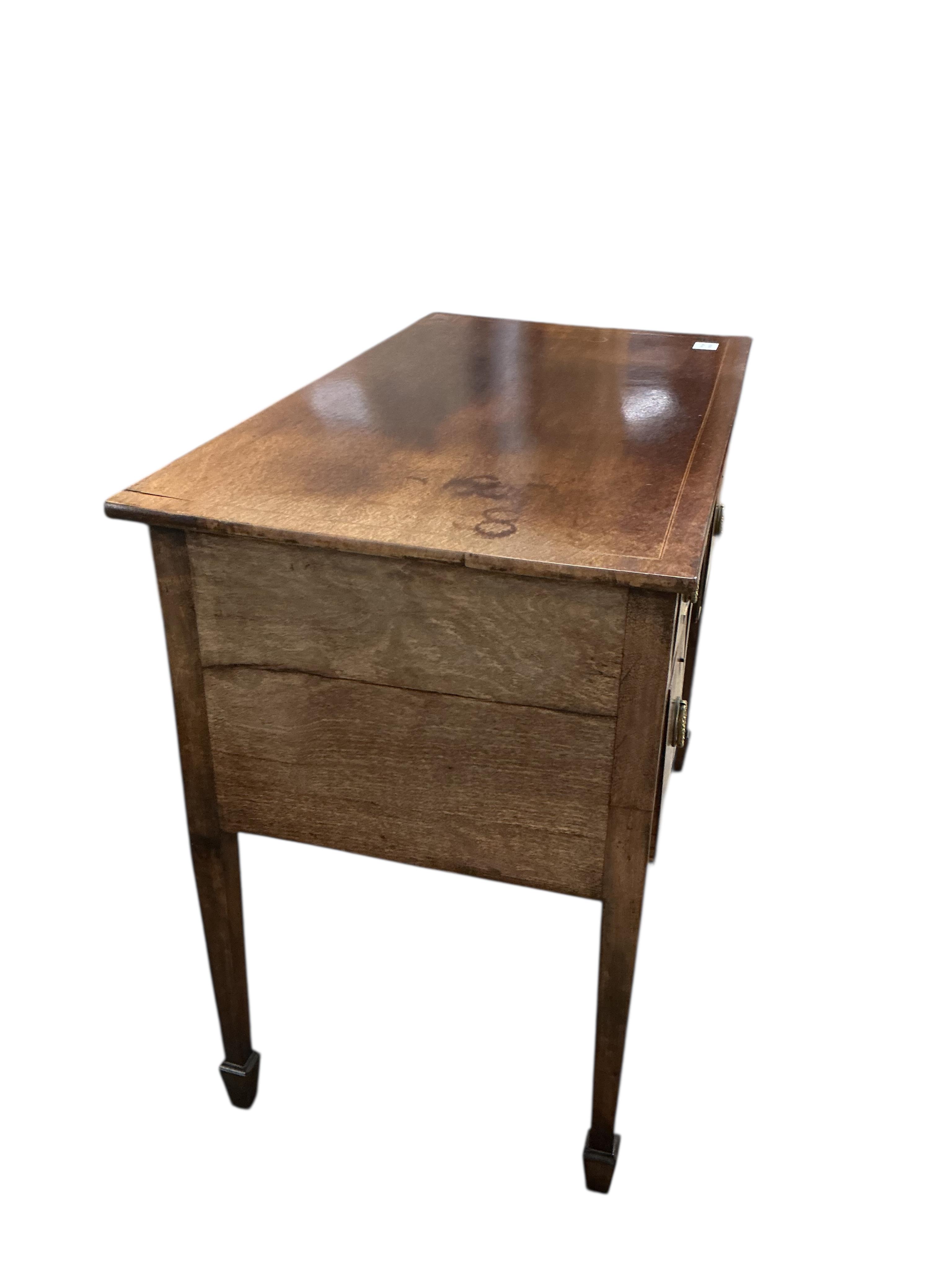 A George III rectangular inlaid mahogany kneehole dressing table, fitted one long and two short drawers, width 91cm, depth 49cm, height 75cm